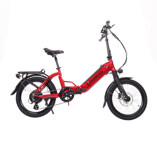 Red electric bike with black details, featuring a step-through frame, robust tires, and rear rack.